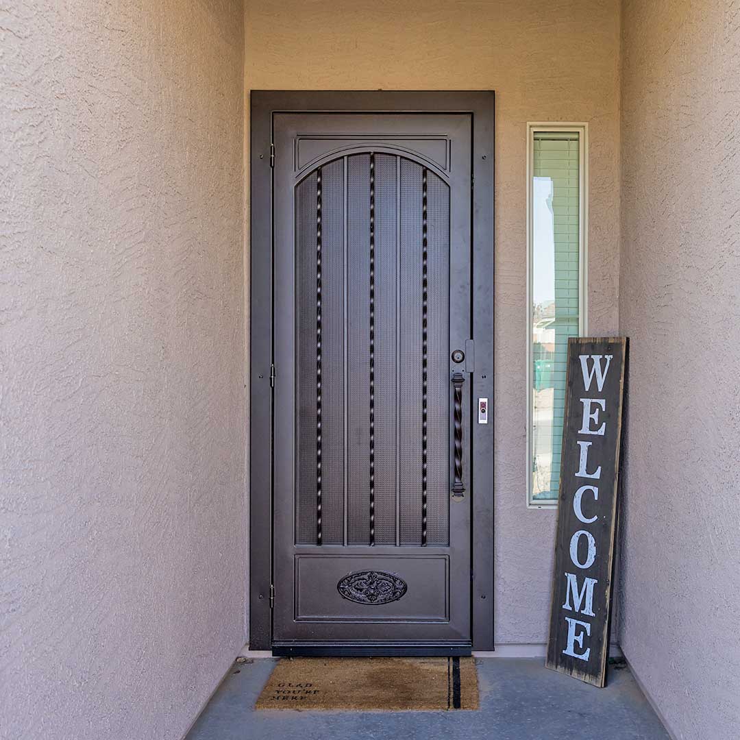 Trend Setters Iron Door Upgrades Worth A Look In 2023 First   Royale Iron Security Door Signature Traditional Single Left Hand Forged Twisted Faux Arch Sm 