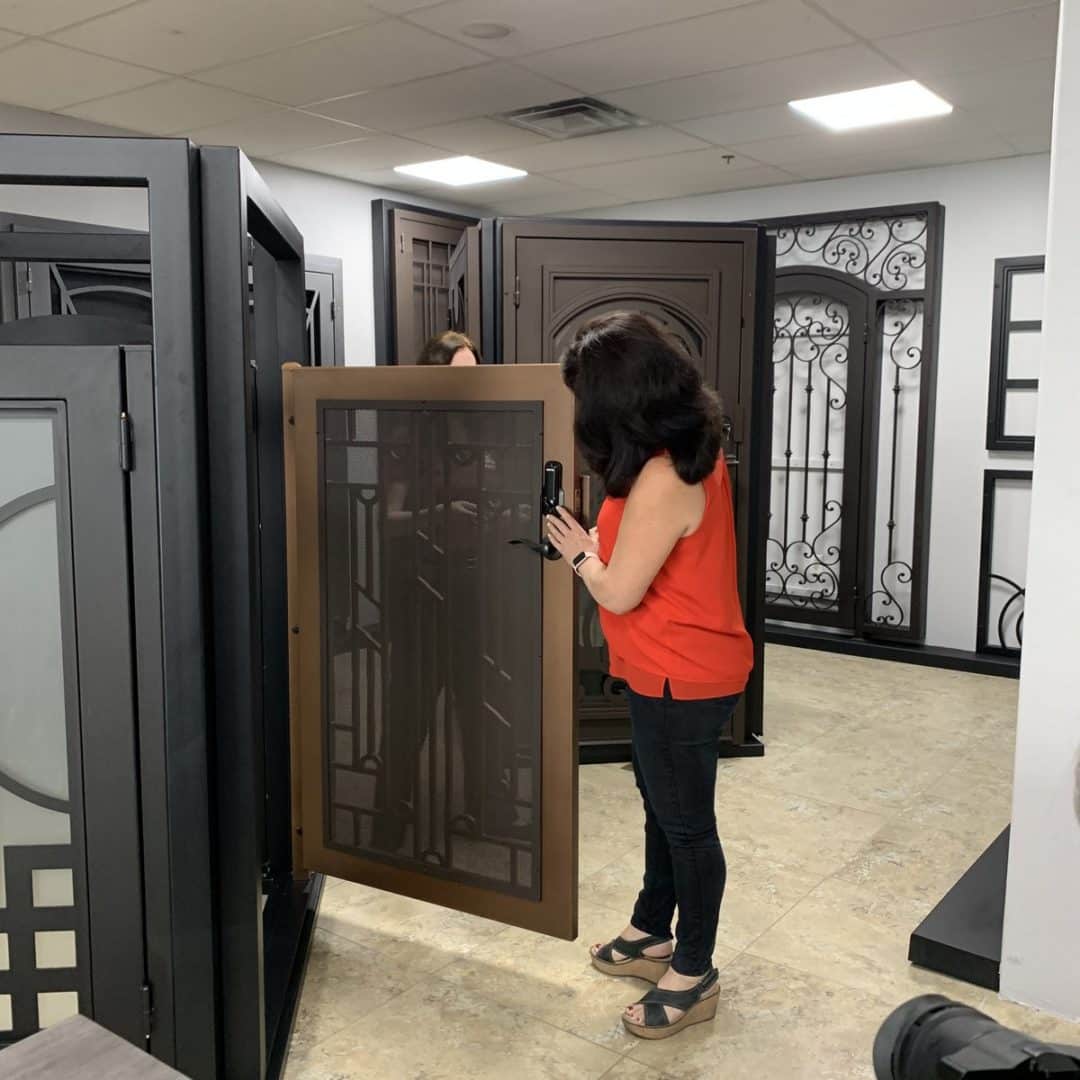 Homeowner shopping at one of the First Impression Ironworks showrooms