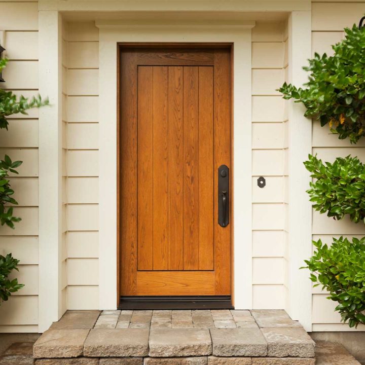 Front of a house with a wooden front door