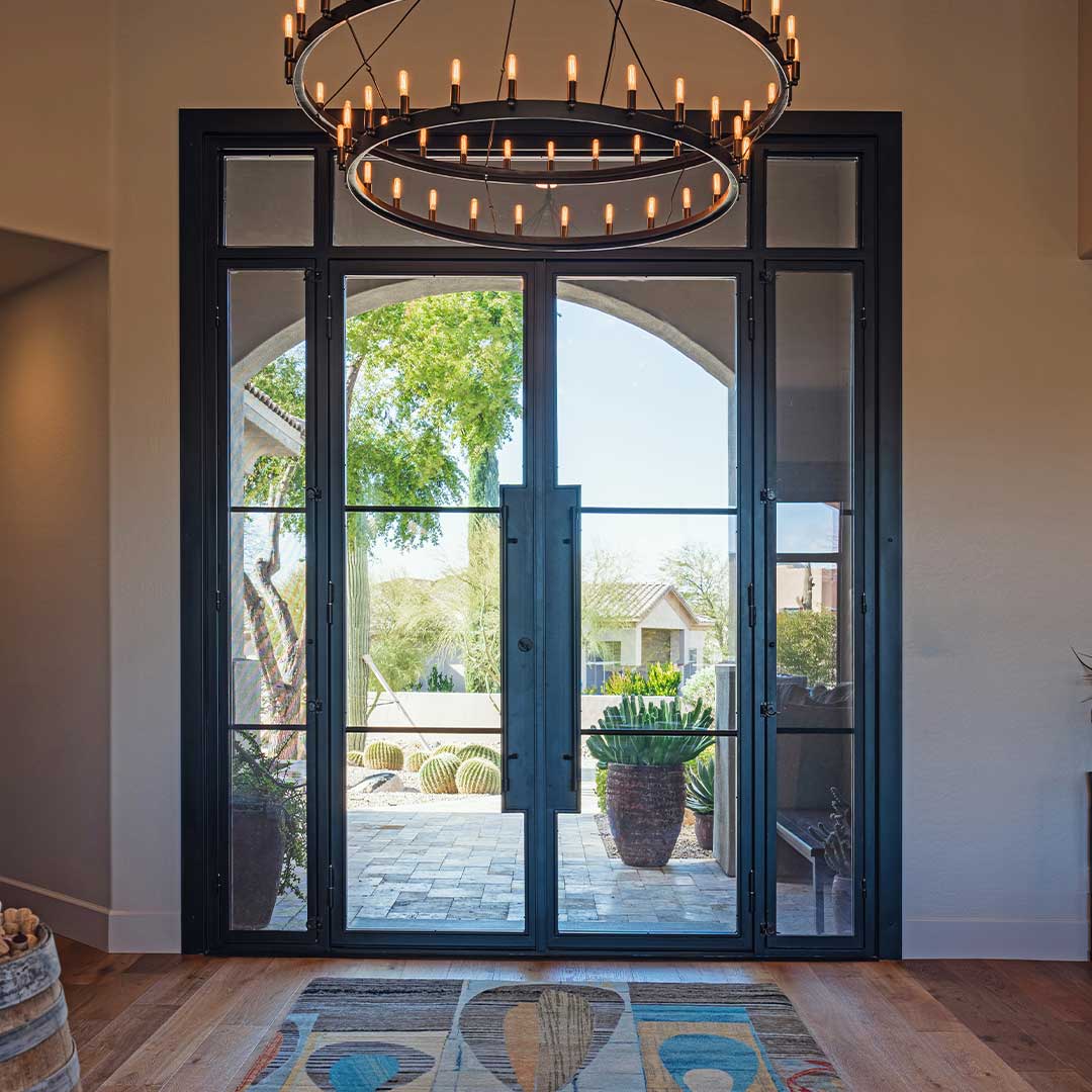 First Impression Ironworks custom modern iron and glass entry door.